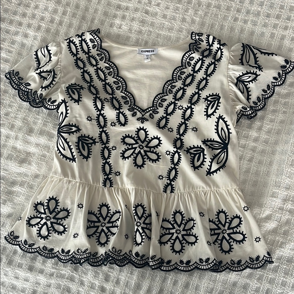 Express White and Navy Peplum Blouse with Flutter Sleeves